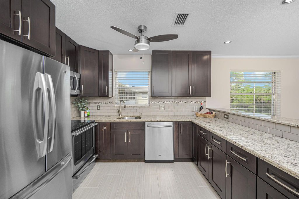 Photo of 16 Lake Vista Trail #202, Port Saint Lucie, FL 34952 (MLS # R11053849)