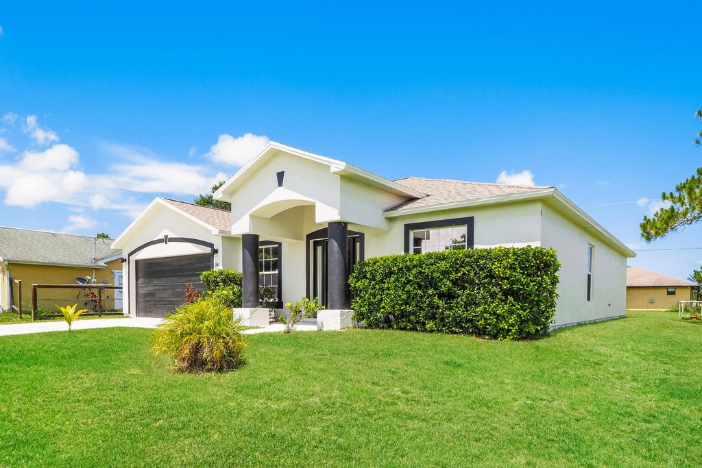 Photo of 1141 SW Broadview Street, Port Saint Lucie, FL 34983 (MLS # B26014713)