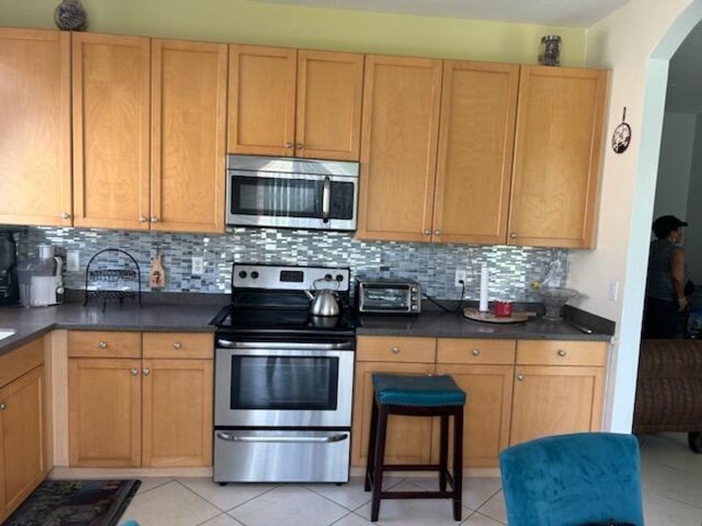 Photo of 9981 SW Glenbrook Drive, Port Saint Lucie, FL 34987 (MLS # R10963569)