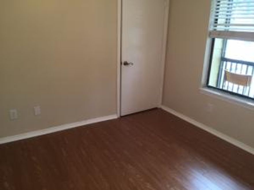 Second floor 2/1 with brand new laminate wood floors and updated kitchen and bath. Master has a walk in closet. Features a large balcony with storage closet and washer/dryer. 600 credit score and clean background required. Community is gated and has a pool, gym, tennis, and basketball.