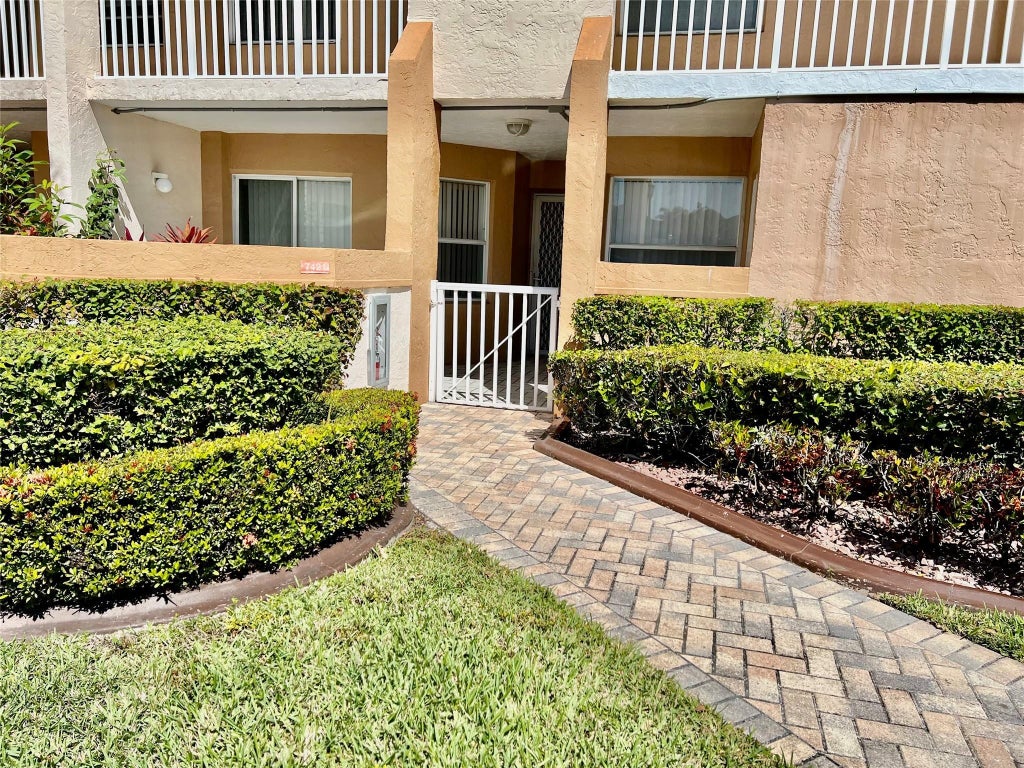 Photo of 7421 Granville Drive #111, Tamarac, FL 33321 (MLS # F10488082)