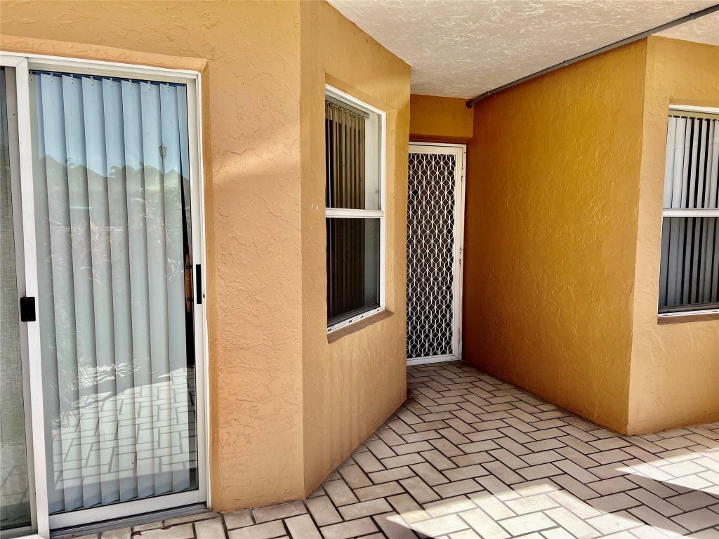 Photo of 7421 Granville Drive #111, Tamarac, FL 33321 (MLS # F10488082)