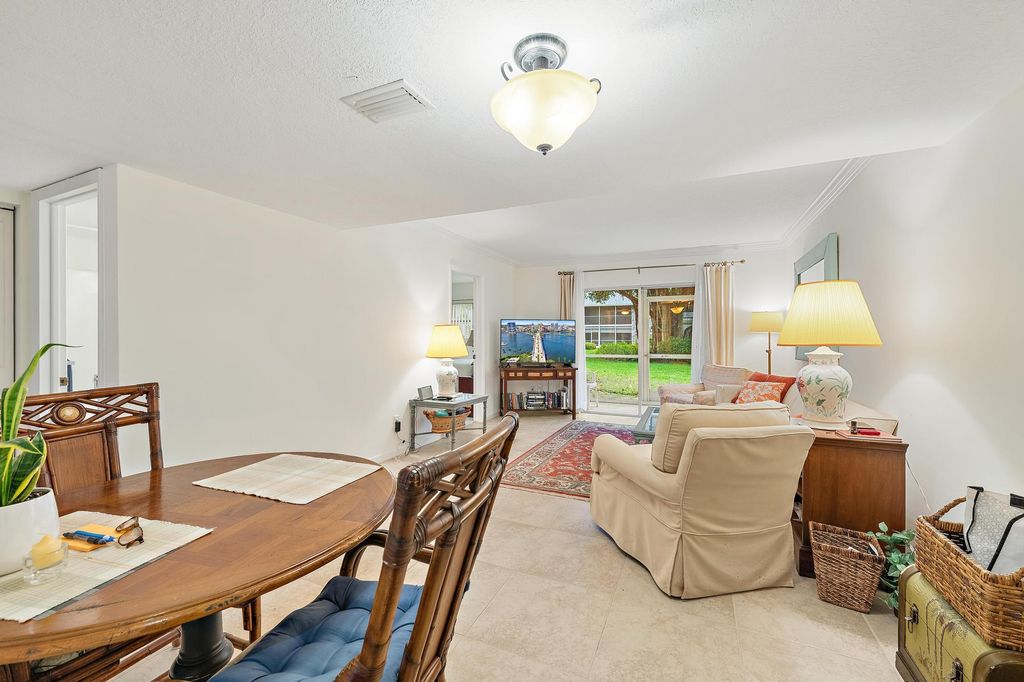 Photo of 18081 SE Country Club Drive #6-51, Jupiter, FL 33469 (MLS # B26004520)