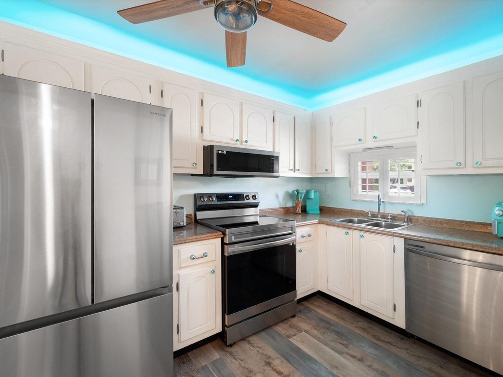 Photo of 311 S Hollybrook Dr #104, Pembroke Pines, FL 33025 (MLS # F10532324)