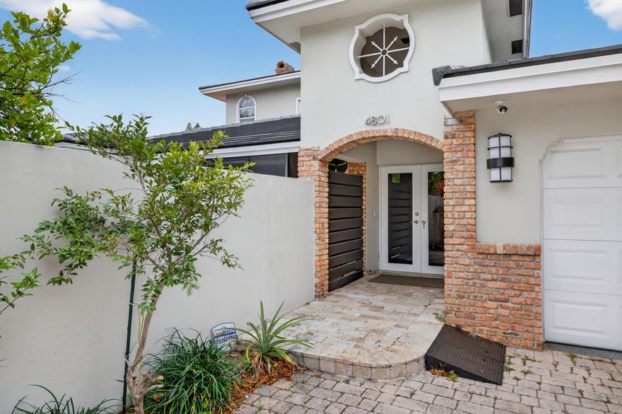 The Perfect Family Home in Wonderful Coral Ridge Country Club Neighborhood Less Than One Mile to the Beach. Hard Wood Floors Flow Throughout This Home. Huge chefs Kitchen Has Sub Zero Stainless Freezer & Glass Front Fridge, Wolf Propane Cooktop & Double Ovens, Custom Cabinetry & A Large Walk In Pantry.  Quartzite Kitchen Island Opens to Formal Dining & Large Living Area Great for Entertaining at the Wet Bar or Relax w/Wood Burning Fire. Massive Upstairs Owners Suite gives Complete Privacy & Includes His & Her Walk In Closets, His & Her Baths are Connected by a Large Walk In Shower. VIP Guest Bedroom w/Ensuite Bath & Walk In Closet. Guest Bedroom 3 & 4 Share Large Jack & Jill Bath. Guest Bed #5 is Very Large. New Roof 2024, Two New AC's 2025. Covered Patio Opens to Private Heated Pool,   Refinished in 2025. Backyard Offers Custom Kitchen & Enough Space for Games on the Ping Pong Table. This is a Turn Key Opportunity With All Furniture Included.  A Truly Must See Home in a World Class Neighborhood.