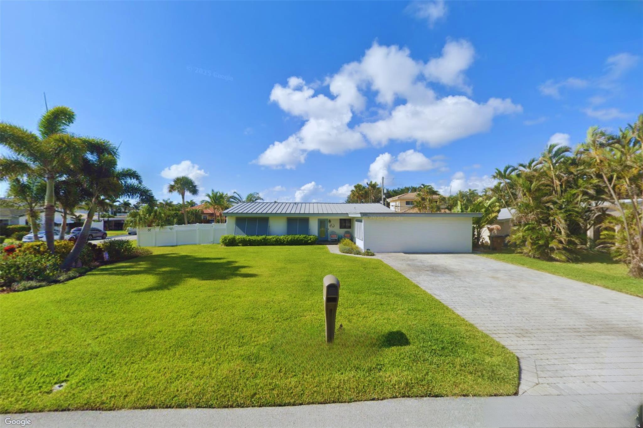 Welcome to this rare opportunity in the highly desirable Cove neighborhood of Deerfield Beach. Situated on an oversized corner lot, this home offers exceptional privacy and just a short walk to The Cove Shopping Center, boating marina, sand & ocean.
Inside, you'll find all impact windows, a durable metal roof, a brand-new water heater, and freshly painted interiors. The kitchen is equipped with Whirlpool appliances (3 yrs old), and each bedroom features customized cedar-lined linen closets. The converted garage, with its own private side entrance, presents endless possibilities—perfect for a guest suite, home office, or additional living space. Enjoy the Florida lifestyle year-round in the screened-in lanai with a covered roof, spacious backyard with more room to add a pool.