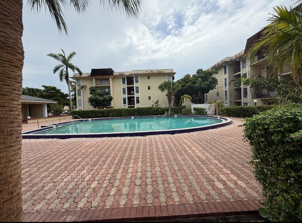 This two-bedroom, one and a half bath condo located in Capri Gardens presents a unique opportunity for buyers seeking a budget friendly option with strong potential for improvement. The interior is in need of updating and provides a blank canvas for renovation or investment. The unit has a balcony with an incredible view of the courtyard below. Owners have the luxury of a swimming pool, fitness area, and tennis courts at their disposal. This unit includes two assigned parking places on the ground level. The management company is on-site and are proactive in seeing that the resident's needs and property overall are attended to. With vision and effort this property will become a great primary residence or investment vehicle for investors. The special assessment has been PAID IN FULL.