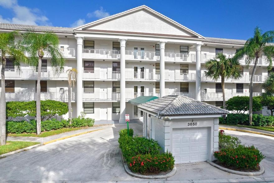 Beautiful 2-bedroom, 2-bathroom apartment with ADDITIONAL room that may be used as a den/office. Renovated unit with newer appliances, flooring, paint, impact windows and water heater. Almost 1,400 SF of living space and low HOA fees. This unit can be rented immediately, or it is ready for new owner to make it their home. Whitehall is a gated community with 24 hour security. The community features a large clubhouse and Olympic sized swimming pool. Close proximity to Tanger Outlets and Whole Foods. Minutes to downtown West Palm Beach and Palm Beach International Airport. BRAND NEW AC JUST INSTALLED.