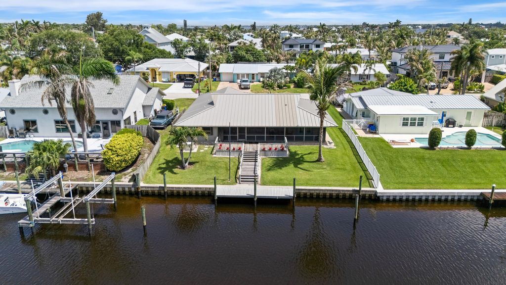 Photo of 1604 SW Seagull Way, Palm City, FL 34990 (MLS # B26043779)