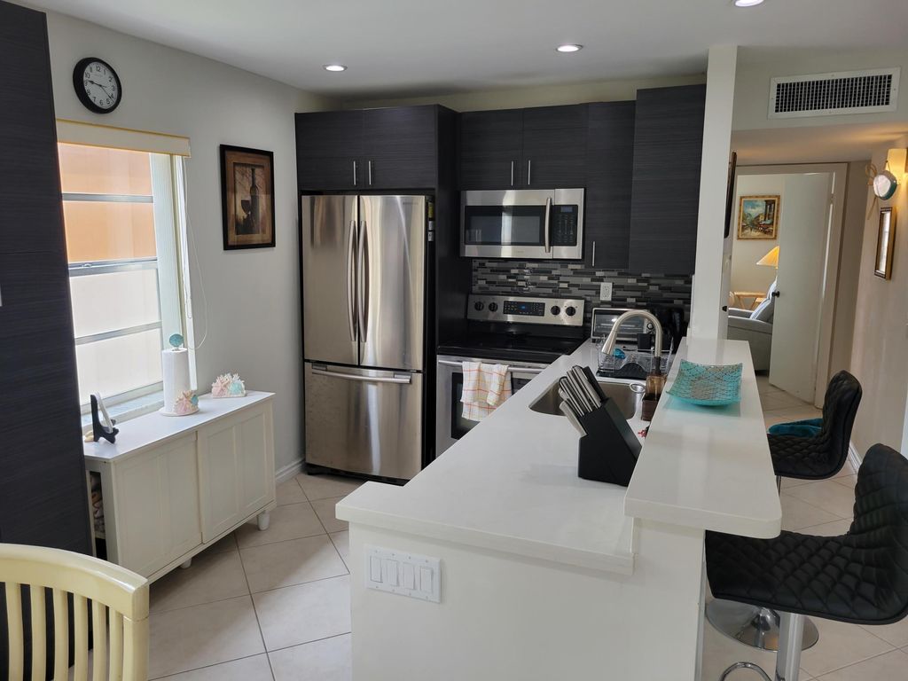 Photo of 662 Burgundy N, Delray Beach, FL 33484 (MLS # R11110037)