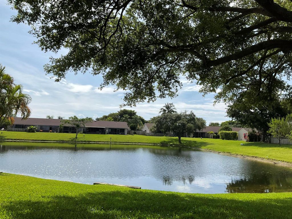 Photo of 5120 NW 11th Drive, Deerfield Beach, FL 33064 (MLS # R10893116)