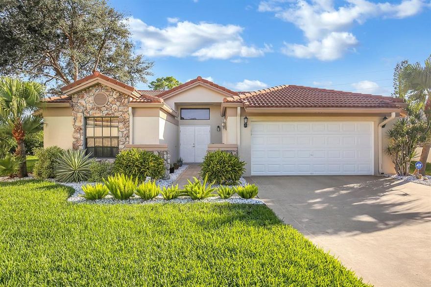 A picture is worth 1000 words. Not your average home, nor your average 55+ community.  This pristine home will not disappoint.  Tile and laminate floors throughout. Kitchen has been updated with new cabinets, granite counters, leaving plenty of  room for the chef.  Formal dining areas and lots of living space.  Barrel tile roof, new a/c 2017, gutters, landscaping.  New hurricane impact garage door and front main entry door 2018.  Transferable ECM home warranty.  If you are looking for a 3/2  this is a must see.  Call today for an exclusive showing!