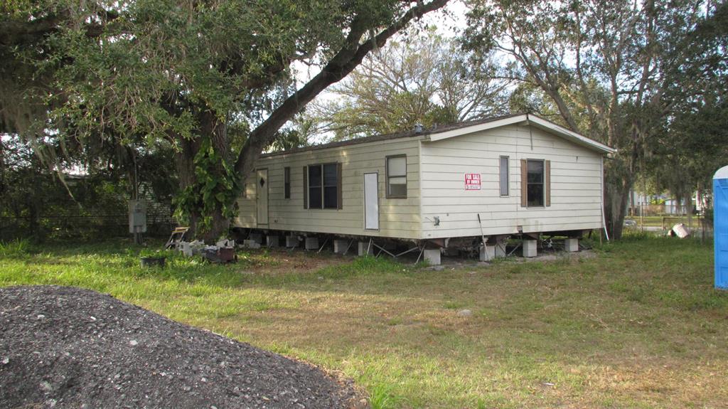 Drastically reduced in price to sell fast! Price is final; not negotiable. Own this Corner Lot; Price includes a Mobile Home that needs repairs.
