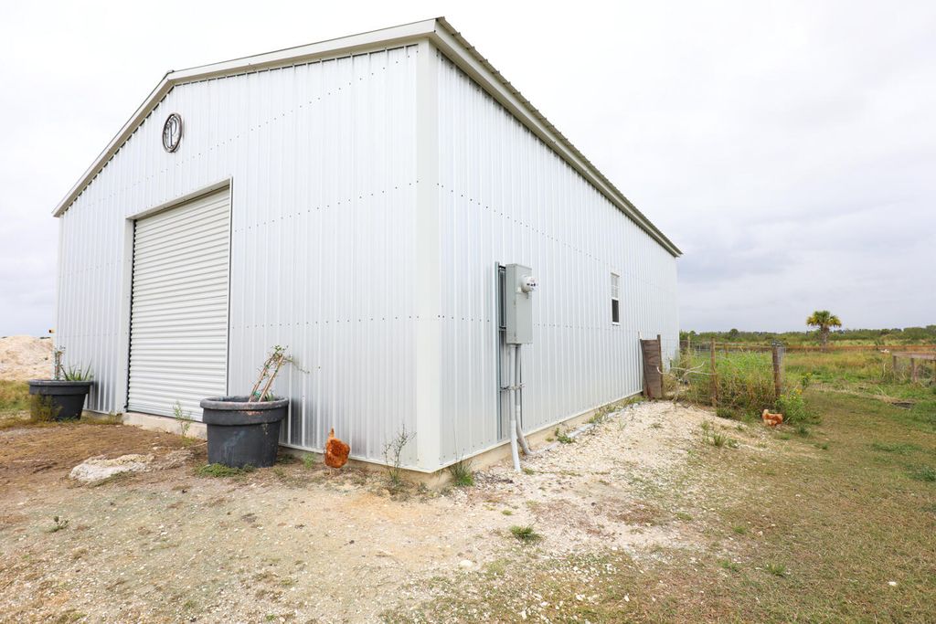 Photo of 16500 Carole Noon Lane, Fort Pierce, FL 34945 (MLS # R10951546)