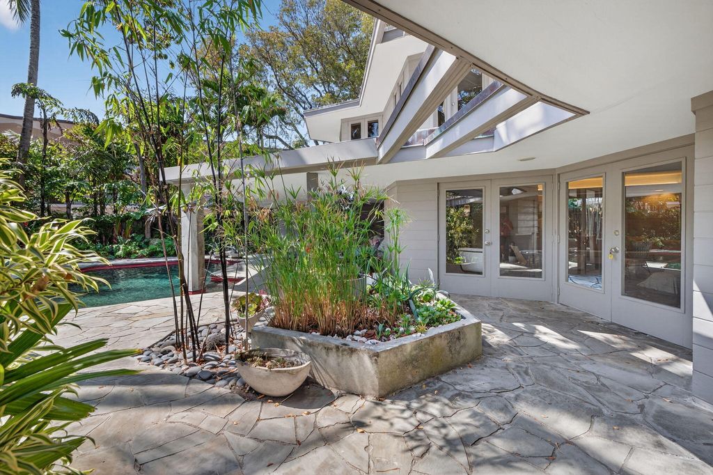 Photo of 2040 Coral Reef Drive, Pompano Beach, FL 33062 (MLS # B26008668)