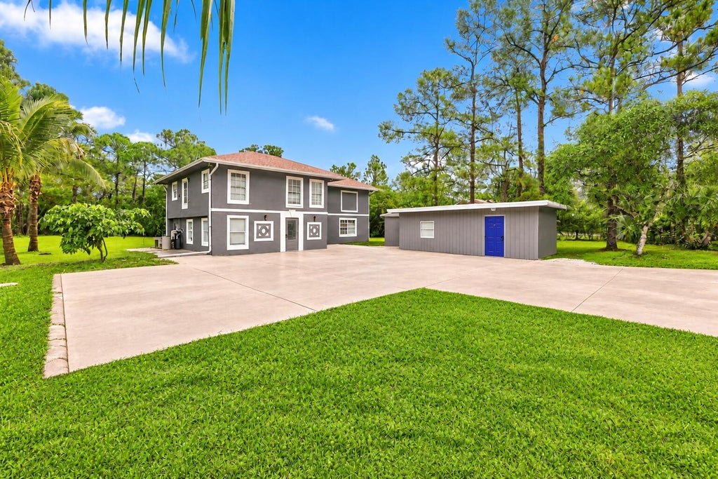 Photo of 11193 49th Street N, West Palm Beach, FL 33411 (MLS # B26088400)