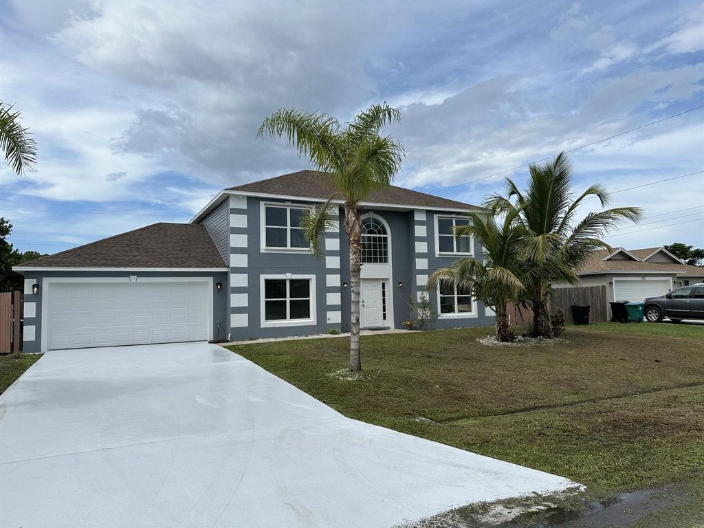 Photo of 1711 SW Starman Avenue, Port St Lucie, FL 34953 (MLS # R10913220)