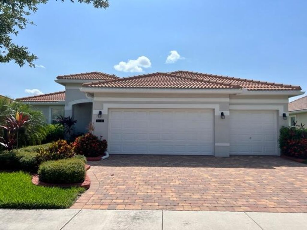 Photo of 12133 SW Aventino Drive Dr, Port Saint Lucie, FL 34987 (MLS # R10811795)