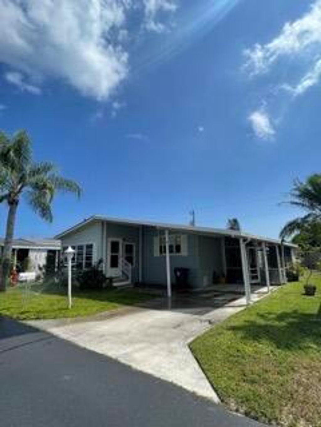 Photo of 3385 Lake Overlook Place, Lake Worth, FL 33462 (MLS # R10875079)