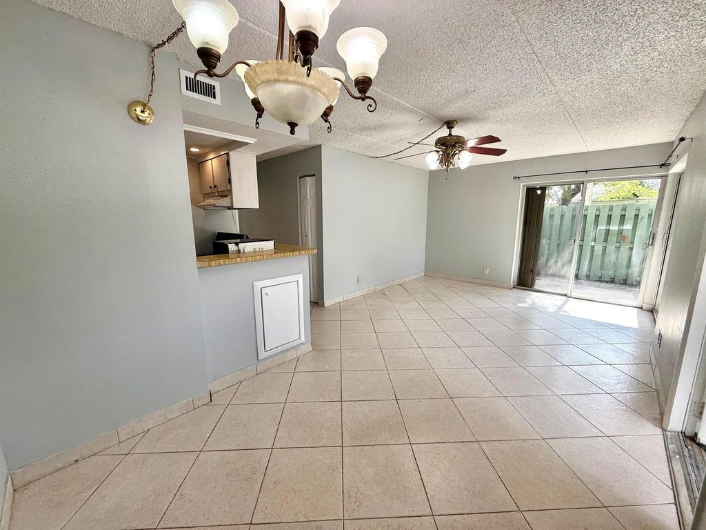 Photo of 1821 Fairview Villas Drive #2, Palm Springs, FL 33406 (MLS # R11088436)