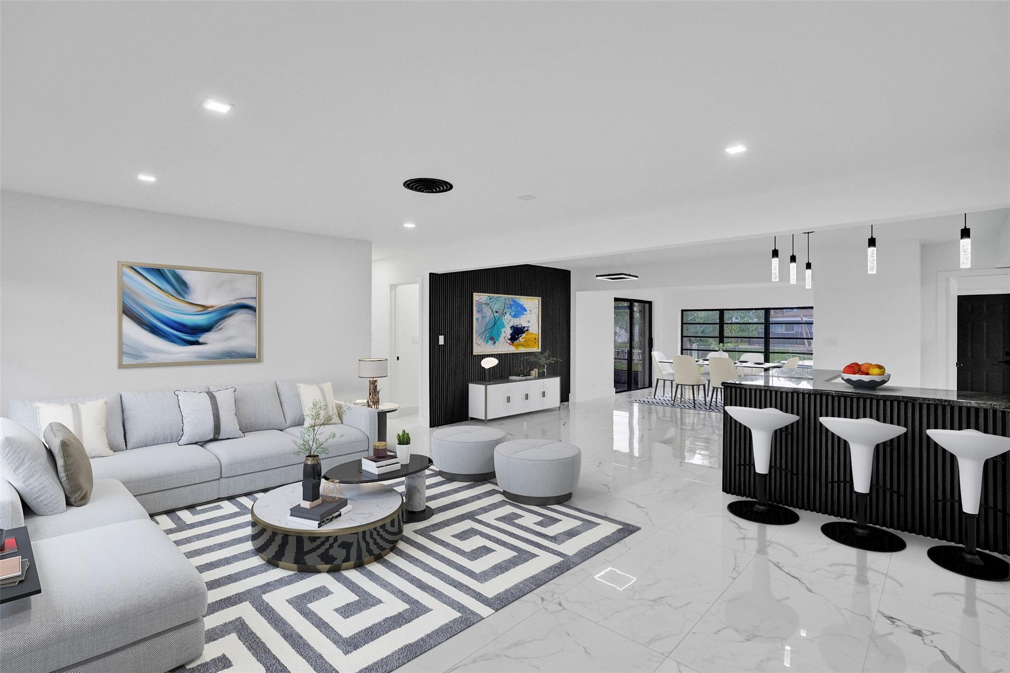 PRICED TO SELL! This remodeled 4 bedroom 2 bathroom waterfront home in Plantation Isles offers direct ocean access and is just minutes from Fort Lauderdale. The spacious open layout features sleek finishes, striking veneer accent walls, a modern kitchen with stainless steel appliances, and updated bathrooms. Designed for those who appreciate contemporary style and serene water views, the property also offers a backyard with space for a pool, creating endless outdoor possibilities. With no HOA, this is a rare opportunity to enjoy comfortable and stylish waterfront living.