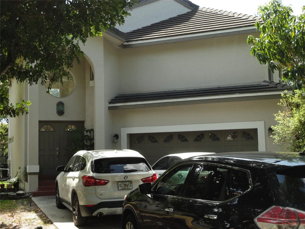 Photo of 5910 NW 59th Avenue, Parkland, FL 33067 (MLS # F10424271)