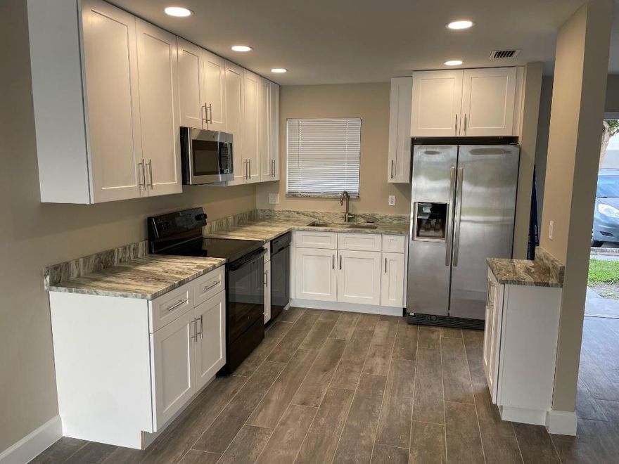 Freshly renovated 2/2.5 bathroom. 2 Parking spaces, Washer and dryer. Fresh cabinets, floor and paint throught. You won't find one this nice in canalakes on the lake! This one won't last!