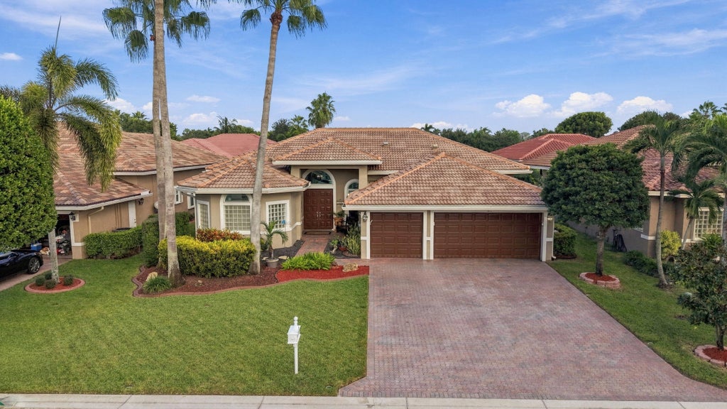 Photo of 5115 NW 125th Avenue, Coral Springs, FL 33076 (MLS # B26091009)