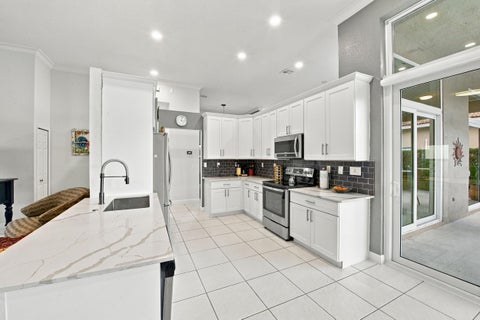 Tiny photo for 5115 NW 125th Avenue, Coral Springs, FL 33076 (MLS # B26091009)