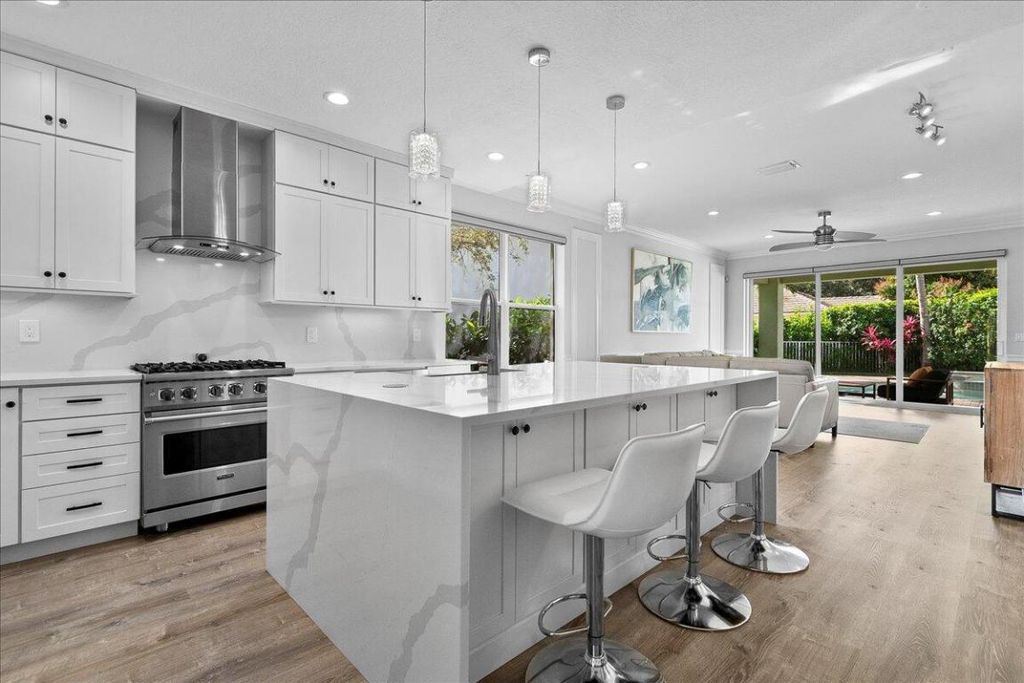 Photo of 102 Mulberry Grove Road, West Palm Beach, FL 33411 (MLS # R11153210)