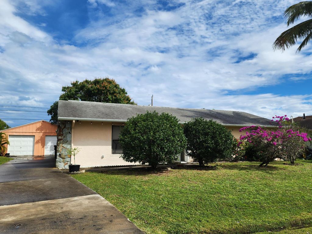 Photo of 1821 SE Dranson Circle, Port Saint Lucie, FL 34952 (MLS # R10958295)
