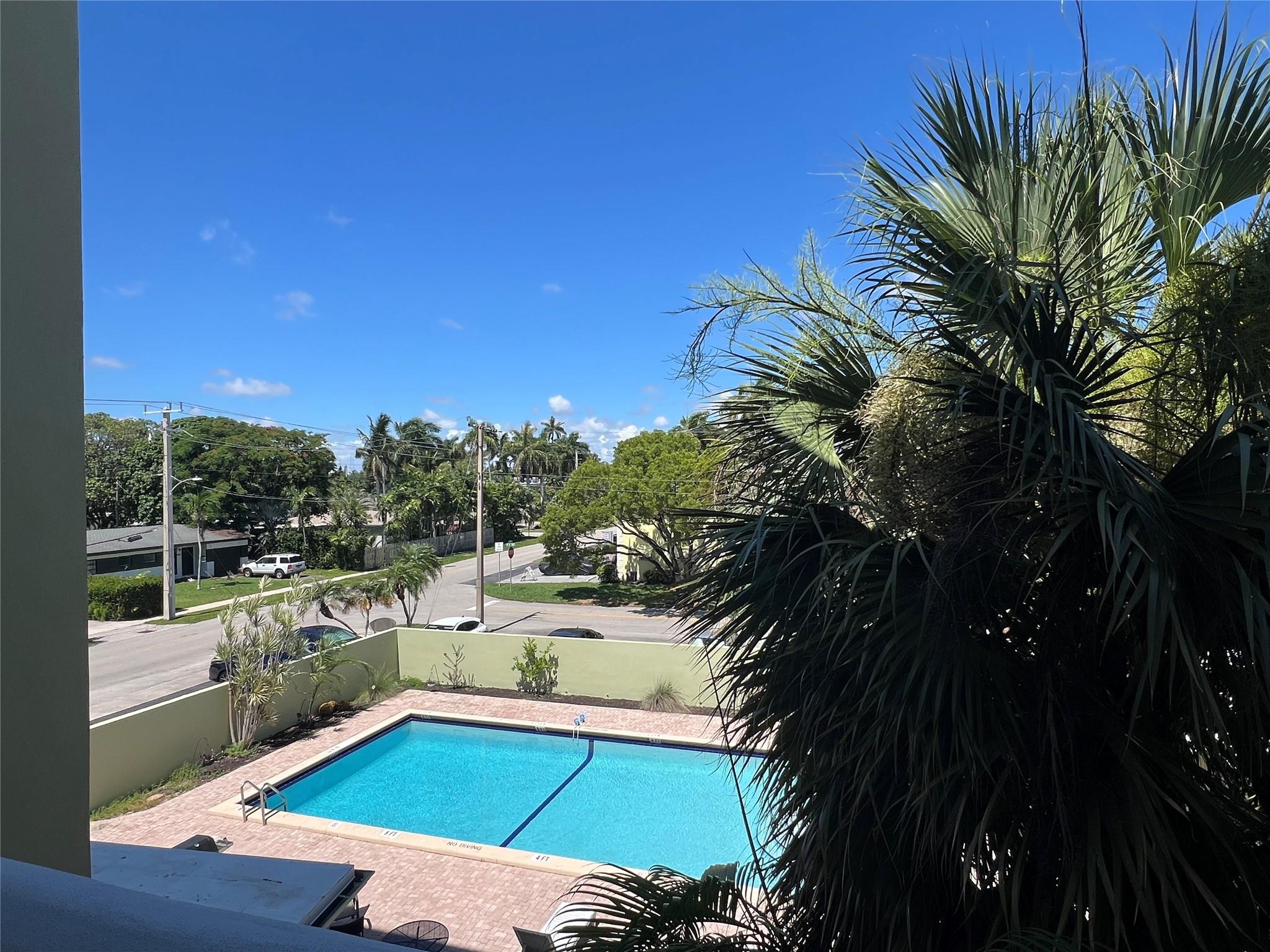 Beautiful spacious condo with the pool view in the nice building. Great location in the quiet neighborhood East of US1 next to the Golf Course and quick bike ride to the beaches. Heated pool, sauna, grill. Screened porch. All Ages. Hot water and basic cable included. Partially furnished. Full bathroom and powder room. Pets allowed- 1($100 application fee) First, last month and security deposit required to move in.