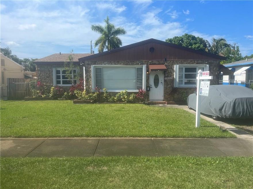 SPACIOUS TWO BEDROOM, TWO BATH HOUSE SET US AS A TWO BEDROOM, ONE BATH MAIN HOUSE AND A SEPARATE IN-LAW/GUEST STUDIO APARTMENT. THIS HOME FEATURES A NEW ROOF, CENTRAL AIR, TILE FLOORS, FLORIDA ROOM, SCREEENED PATIO, SHUTTERS, LARGE FENCED YARD WITH FRUIT TREES AND A WORKSHOP/SHED. EXCELLENT NEIGHBORHOOD CLOSE TO THE BEACH AND DOWNTOWN HOLLYWOOD.