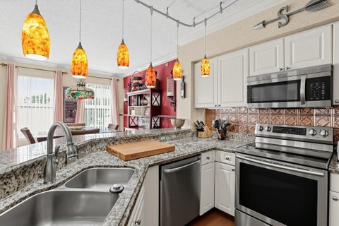 Tiny photo for 6918 W SAMPLE Road #6918, Coral Springs, FL 33067 (MLS # B26088649)