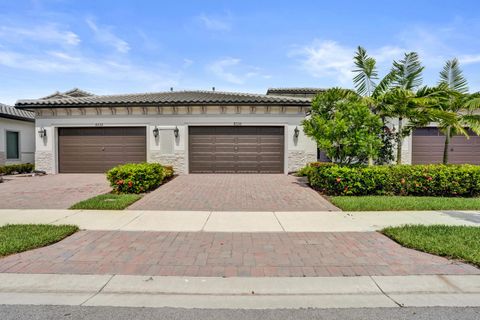 Photo of 8336 W Blue Spring Drive, Parkland, FL 33067 (MLS # B26035088)