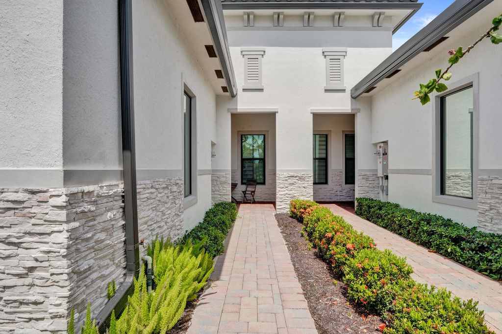 Photo of 8336 W Blue Spring Drive, Parkland, FL 33067 (MLS # B26035088)
