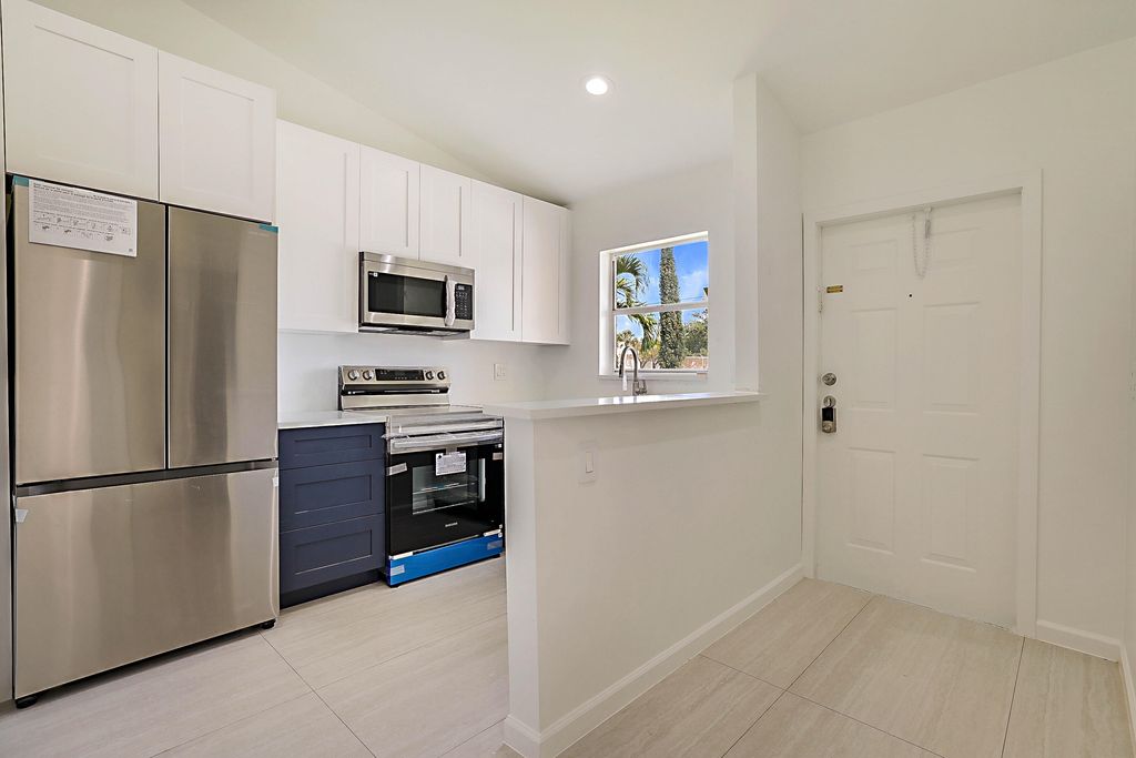 Photo of 320 NE 42nd Street, Boca Raton, FL 33431 (MLS # B26020365)