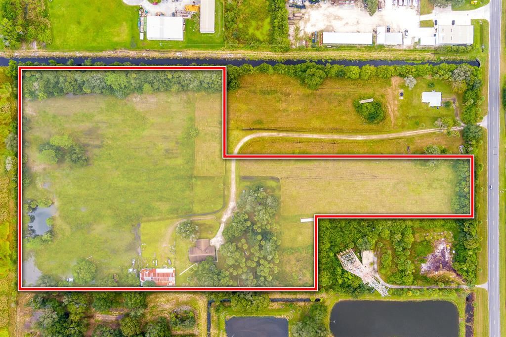 Photo of 16200 Orange Avenue, Fort Pierce, FL 34945 (MLS # R10761603)