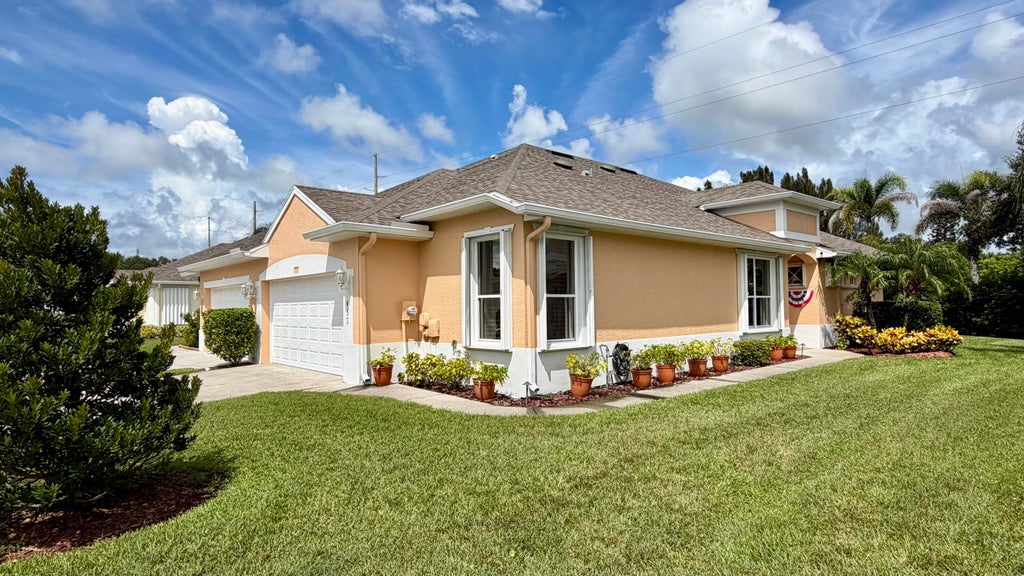 Photo of 433 N Tangerine Square SW, Vero Beach, FL 32968 (MLS # B26079593)