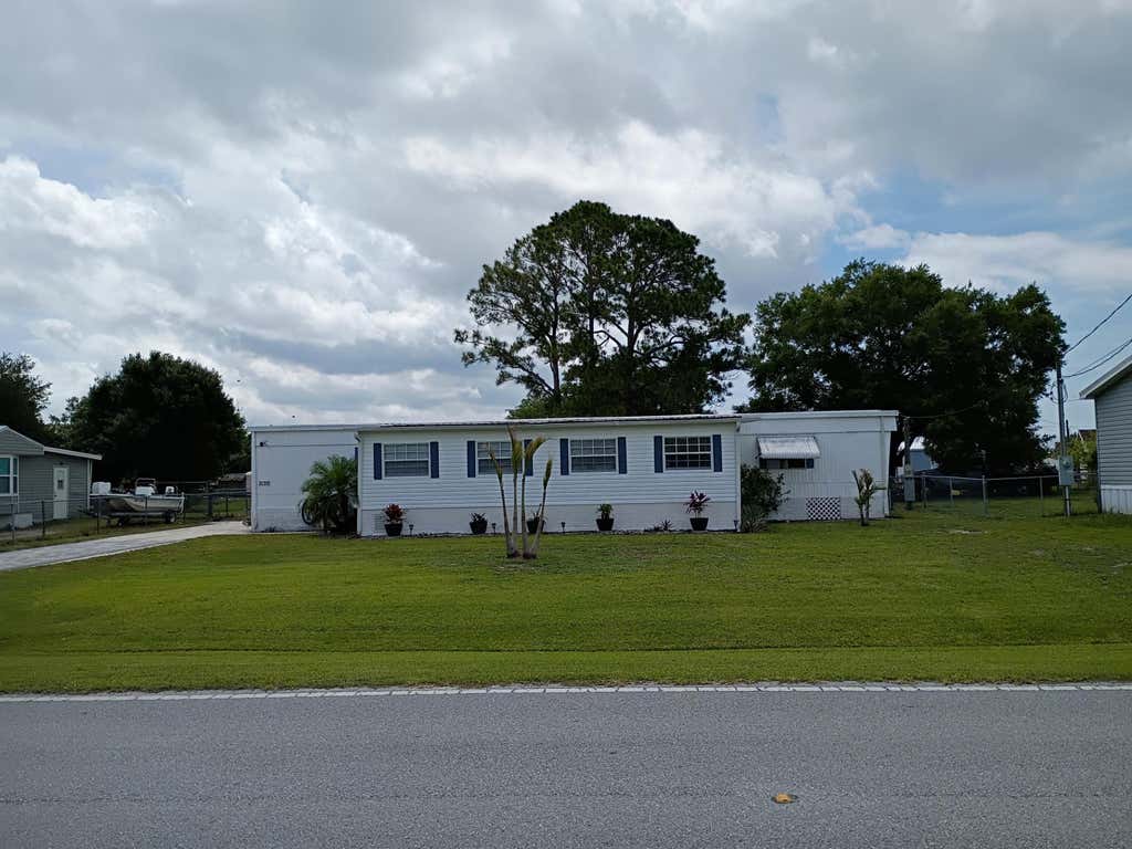 Photo of 2130 SE 24th Boulevard, Okeechobee, FL 34974 (MLS # B26027462)