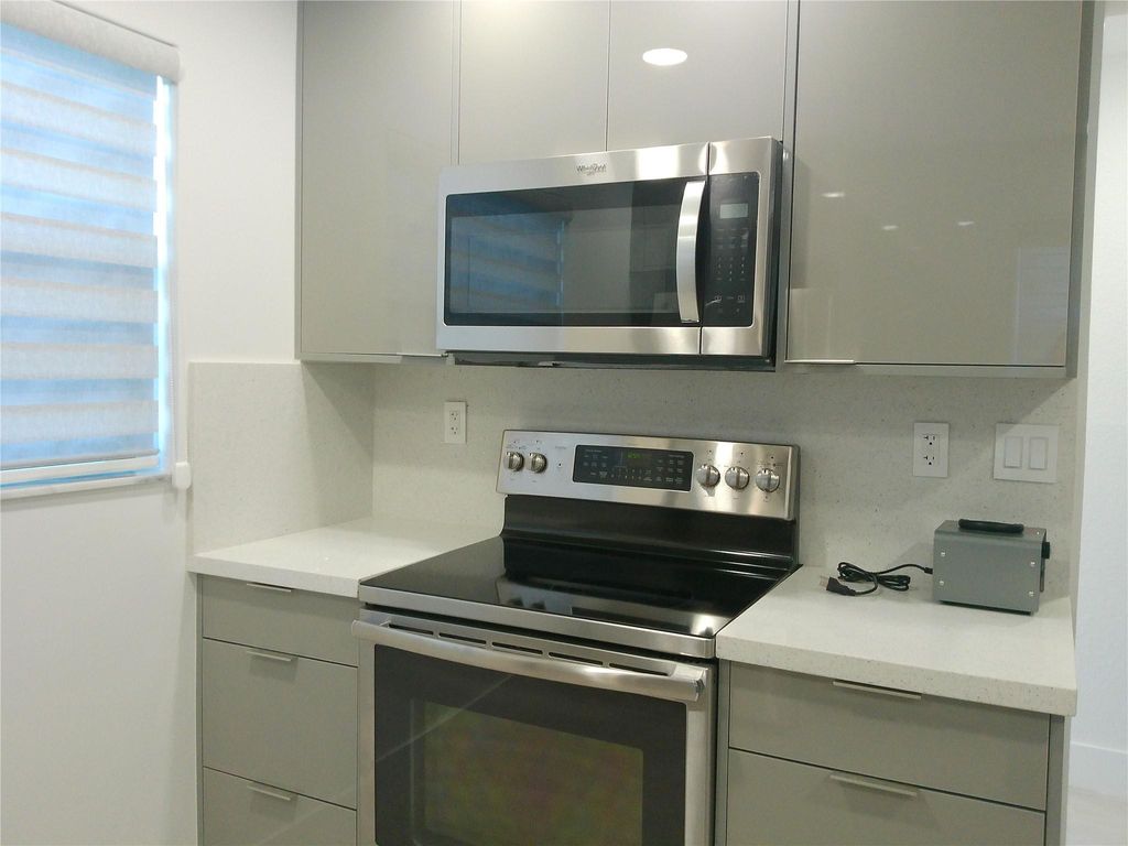 Photo of 6085 N Sabal Palm Blvd #109, Tamarac, FL 33319 (MLS # F10542444)