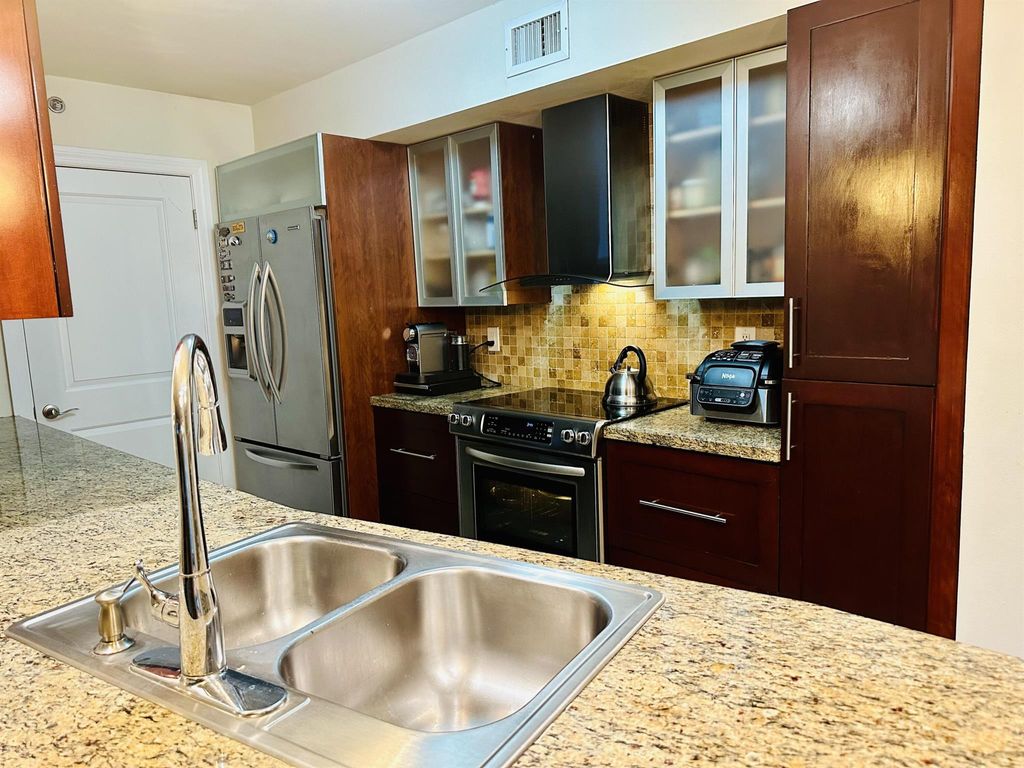 Photo of 3153 Clint Moore Road #102, Boca Raton, FL 33496 (MLS # R10924601)