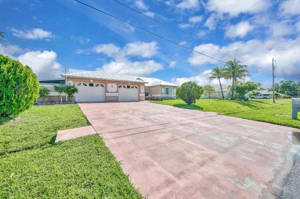 Photo of 1732 SW Lexington Drive, Port Saint Lucie, FL 34953 (MLS # R10937618)