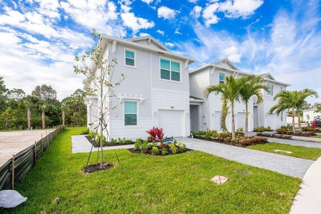 Photo of 824 SE Grovebush Lane, Port Saint Lucie, FL 34984 (MLS # R11095983)