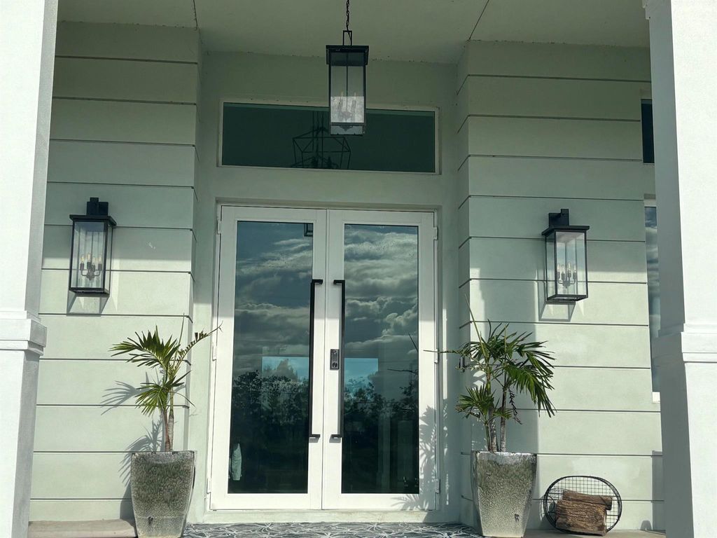 Photo of 1071 S Header Canal Road, Fort Pierce, FL 34945 (MLS # R11078132)