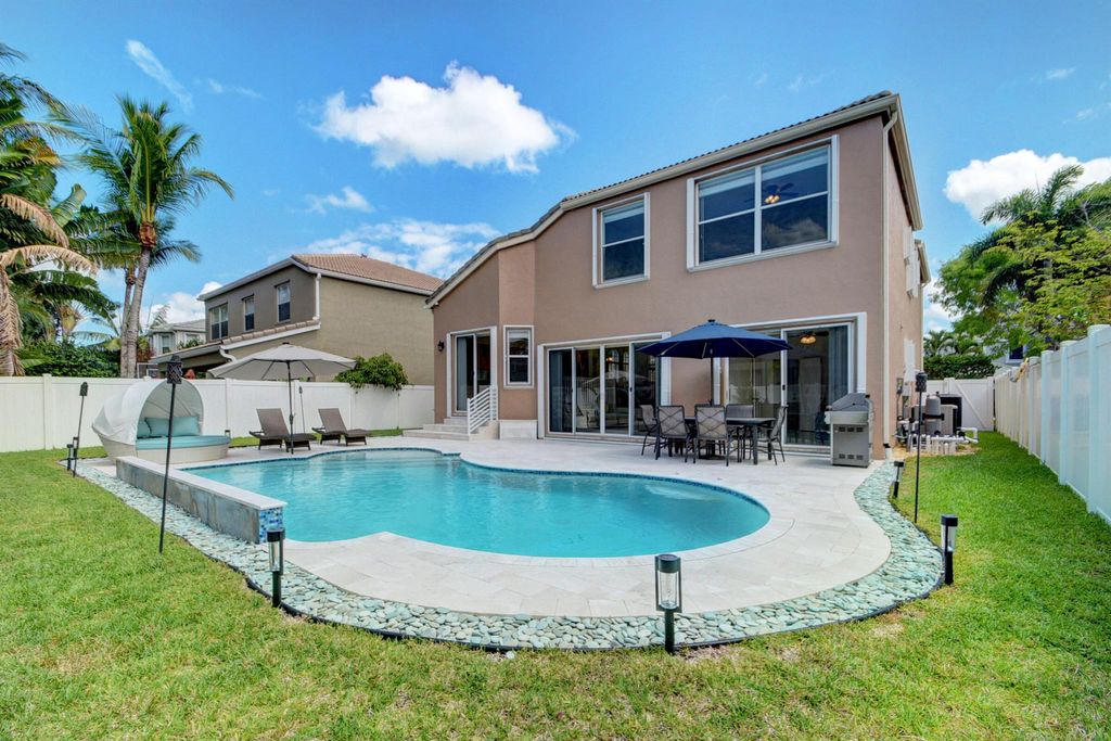 Photo of 2418 Westmont Drive, Royal Palm Beach, FL 33411 (MLS # R11067828)