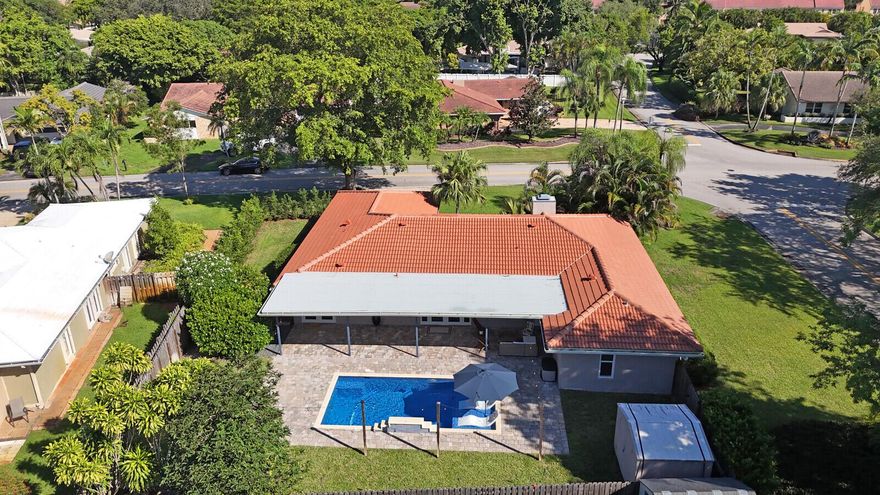 NEW ROOF!!  Welcome to this beautifully updated single-family home in the highly sought-after Maplewood neighborhood! This property is free of HOA restrictions and sits on an oversized lot, offering both freedom and space.Major upgrades bring peace of mind, including a NEW roof, NEW A/C, NEW water heater, and NEW attic insulation. Impact windows and doors throughout provide safety and energy efficiency. On the inside you will find an open, spacious floor plan that has been meticulously maintained. The remodeled kitchen features stainless steel appliances, quartz countertops, and plenty of storage--perfect for modern living and entertaining.