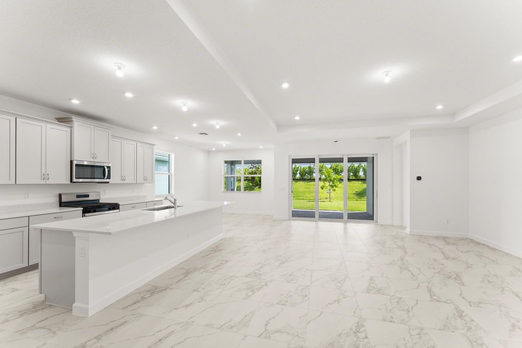 Photo of 10072 SW Carnelian Street, Port Saint Lucie, FL 34987 (MLS # R11128933)