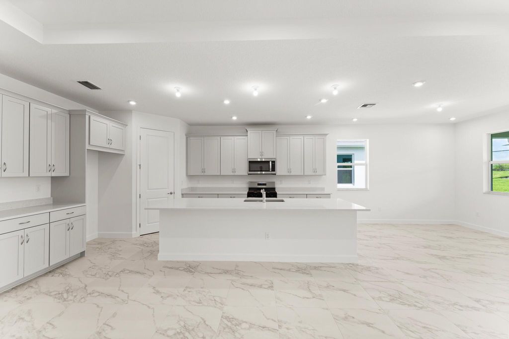 Photo of 10072 SW Carnelian Street, Port Saint Lucie, FL 34987 (MLS # R11128933)