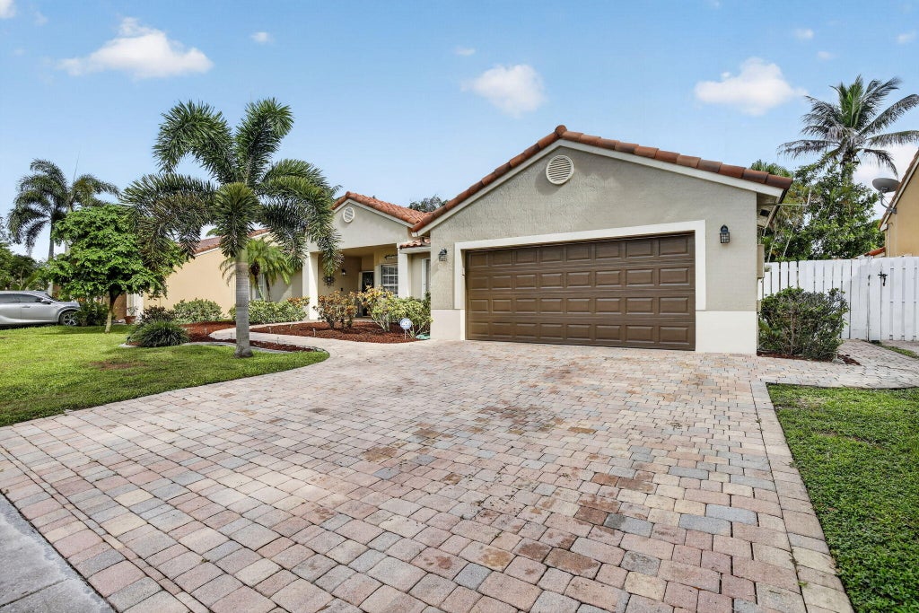 Photo of 13174 NW 11TH Place, Sunrise, FL 33323 (MLS # B26070857)